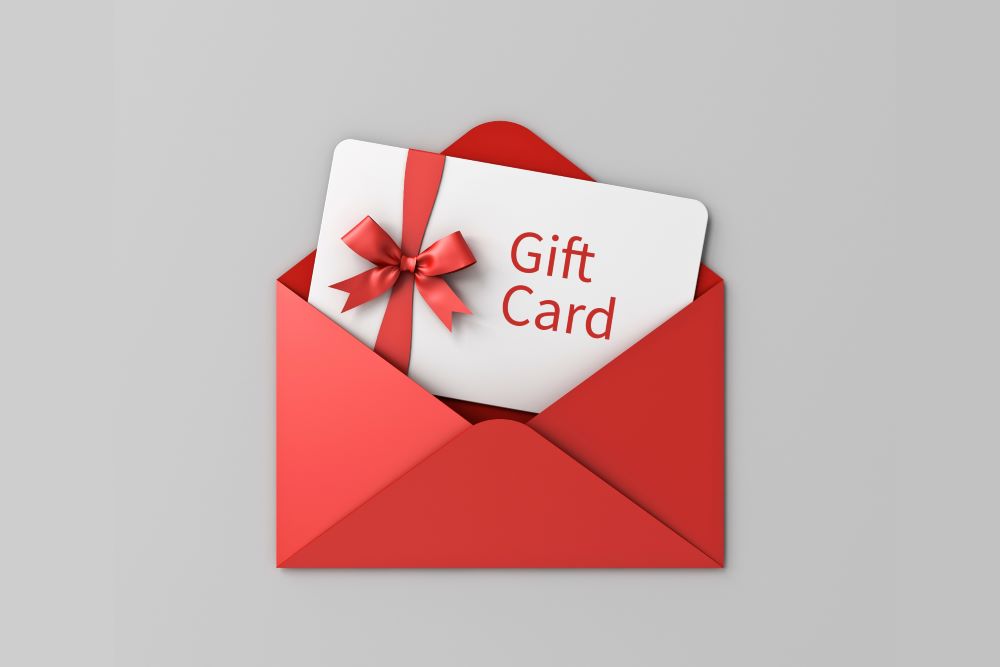 white gift card in red envelope